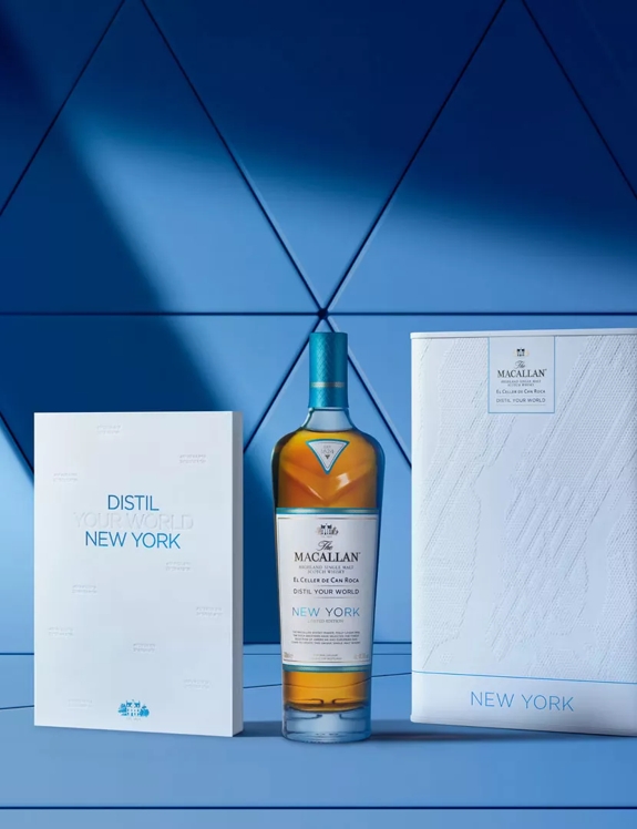 The Macallan Distil Your World New York Box, Bottle and Book on Blue Backdrop