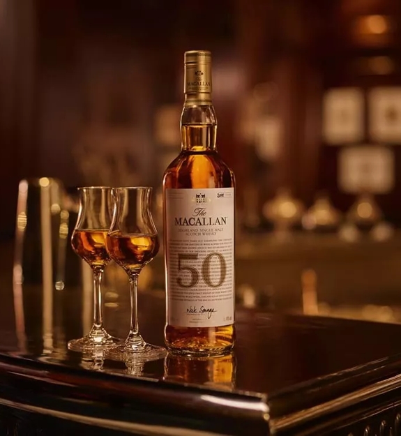 The Macallan 50 year old whisky and two drams in bar setting