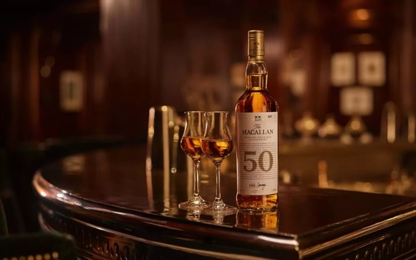 The Macallan 50 year old whisky and two drams in bar setting