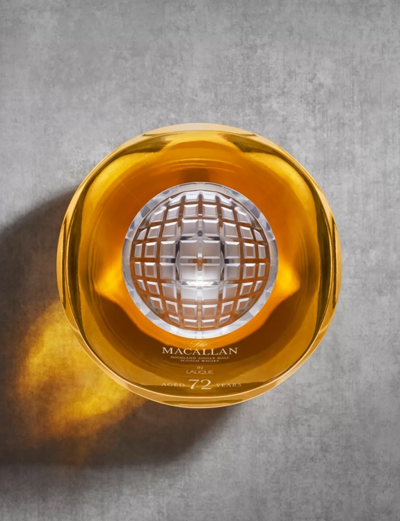 the macallan 72 years old whisky in lalique genesis decanter bottle top