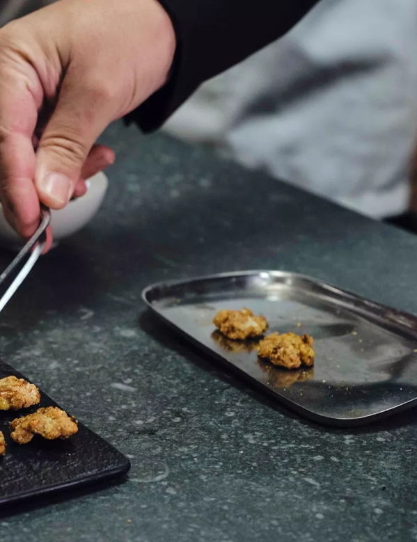 Distil Your World London Food detail being served